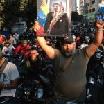 Mobs of motorcycle-riding armed militia hunt Venezuelan streets for Trump supporters as crackdown intensifies